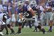 MANHATTAN, KS - AUGUST 30: Offensive tackle Cody Whitehair #55 of the Kansas State Wildcats gets set on offense against the Stephen F. Austin Lumberjacks during the first half on August 30, 2014 at Bill Snyder Family Stadium in Manhattan, Kansas. (Photo