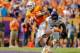 TAMPA, FL - JANUARY 1: Jalen Hurd #1 of the Tennessee Volunteers scores past Traveon Henry #2 of the Northwestern Wildcats during the second half of the Outback Bowl at Raymond James Stadium on January 1, 2016 in Tampa, Florida. (Photo by Mike Carlson/Ge
