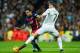 MADRID, SPAIN - NOVEMBER 21: Cristiano Ronaldo of Real Madrid duels for the ball with Dani Alves of Barcelona during the La Liga match between Real Madrid CF and FC Barcelona at Estadio Santiago Bernabeu on November 21, 2015 in Madrid, Spain. (Photo by
