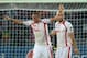 Tunisia's forward Ahmed Akaichi (L) celebrates with Tunisia's defender Aymen Abdennour after scoring a goal during the 2015 African Cup of Nations quarter-final football match between Equatorial Guinea and Tunisia in Bata on January 31, 2015. AFP PHOTO /