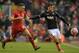 Exeter City's English midfielder Lee Holmes (R) vies with Liverpool's English midfielder Connor Randall during the English FA Cup third round replay football match between Liverpool and Exeter City at Anfield in Liverpool, north west England on January 20