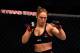 Taking herself out of focus might be a wise move on Rousey's part.