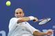 FLUSHING MEADOWS, UNITED STATES: Number two seeded Andre Agassi of the US hits a forehand return to number seven seeded Todd Martin of the US 12 September, 1999, at the US Open Men's Finals in Flushing Meadows, NY. (ELECTRONIC IMAGE) AFP PHOTO/Rober