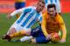 Malaga's Portuguese midfielder Duda (L) vies with Barcelona's Argentinian forward Lionel Messi during the Spanish league football match Malaga CF vs FC Barcelona at La Rosaleda stadium in Malaga on January 23, 2016. AFP PHOTO / JORGE GUERRERO / AFP / Jor
