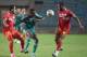Morocco's striker Abdeladim Khadrouf (C) vies for the ball with Tunisian players Hamza Lahmar (L) and Saber Khalilfa (R) during an African Nations Championship (CHAN) qualifying match on October 25, 2015 in Rades. Both Tunisia and Morocco have already qua