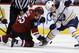 Eichel battles for the puck against the Arizona Coyotes.