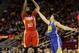 HOUSTON, TX - DECEMBER 31: James Harden #13 of the Houston Rockets shoots over Klay Thompson #11 of the Golden State Warriors at Toyota Center on December 31, 2015 in Houston, Texas. NOTE TO USER: User expressly acknowledges and agrees that, by downloadi
