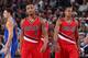 PORTLAND, OR - JANUARY 8: Damian Lillard #0 and C.J. McCollum #3 of the Portland Trail Blazers walk off the court against the Golden State Warriors on January 8, 2016 at the Moda Center Arena in Portland, Oregon. NOTE TO USER: User expressly acknowledges