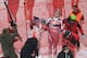 Svindal is helped out of the nets after his costly crash at Kitzbuehel.