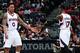 ATLANTA, GA - APRIL 7: Jeff Teague #0 and Dennis Schroder #17 of the Atlanta Hawks shake hands during the game against the Phoenix Suns on April 7, 2015 at Philips Arena in Atlanta, Georgia. NOTE TO USER: User expressly acknowledges and agrees that, by