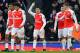 Arsenal's Chilean forward Alexi Sanchez C) celebrates scoring his team's second goal during the English FA Cup fourth round football match between Arsenal and Burnley at the Emirates stadium in London, on January 30, 2016. / AFP / GLYN KIRK / RESTRICTED T