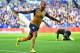 LEICESTER, ENGLAND - SEPTEMBER 26: Theo Walcott of Arsenal celebrates scoring his team's first goal during the Barclays Premier League match between Leicester City and Arsenal at The King Power Stadium on September 26, 2015 in Leicester, United Kingdom.