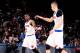 NEW YORK, NY - JANUARY 26: Kristaps Porzingis #6 high fives teammate Langston Galloway #2 of the New York Knicks during the game against the Oklahoma City Thunder on January 26, 2016 at Madison Square Garden in New York, New York. NOTE TO USER: User expre