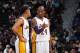 AUBURN HILLS, MI - DECEMBER 6: Kobe Bryant #24 and D'Angelo Russell #1 of the Los Angeles Lakers talk during the game against the Detroit Pistons on December 6, 2015 at The Palace of Auburn Hills in Auburn Hills, Michigan. NOTE TO USER: User expressly ac