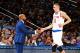 NEW YORK, NY - NOVEMBER 27: Derek Fisher and Kristaps Porzingis #6 of the New York Knicks shake hands during the game against the Miami Heat on November 27, 2015 at Madison Square Garden in New York City, New York. NOTE TO USER: User expressly acknowled