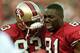 An emotional Terrell Owens, with J.J. Stokes.