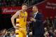 CLEVELAND, OH - JANUARY 30: Matthew Dellavedova #8 of the Cleveland Cavaliers talks with Head Coach Tyronn Lue of the Cleveland Cavaliers during the game against the San Antonio Spurs on January 30, 2016 at Quicken Loans Arena in Cleveland, Ohio. NOTE TO