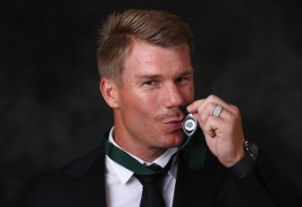 MELBOURNE, AUSTRALIA - JANUARY 27:  David Warner poses after winning the Allan Border medal at the 2016 Allan Border Medal ceremony at Crown Palladium on January 27, 2016 in Melbourne, Australia.  (Photo by Robert Cianflone/Getty Images)