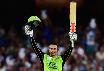 ADELAIDE, AUSTRALIA - JANUARY 21:  Usman Khawaja of the Sydney Thunder reacts after reaching his century during the Big Bash League Semi Final match between the Adelaide Strikers and the Sydney Thunder at Adelaide Oval on January 21, 2016 in Adelaide, Aus
