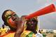 Malian fans cheer for their team as they arrive to attend the 2015 African Cup of Nations group D football match between Ivory Coast and Mali in Malabo on January 24, 2015. AFP PHOTO / ISSOUF SANOGO (Photo credit should read ISSOUF SANOGO/AFP/Getty