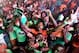 Ivory Coast's supporters celebrate in Abidjan on February 4, 2015 after Ivory Coast won the 2015 Africa Cup of Nations semi-final football match against Democratic Republic of Congo. Ivory Coast won 3-1 in Bata. AFP PHOTO / SIA KAMBOU (Photo credit