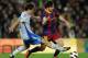 BARCELONA, SPAIN - MARCH 05: Lionel Messi (R) of Barcelona duels for the ball with Ander Herrera of Real Zaragoza during the la Liga match between Barcelona and Real Zaragoza at the Camp Nou stadium on March 5, 2011 in Barcelona, Spain. (Photo by Jasper