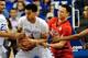 Jan 2, 2016; Lexington, KY, USA; Kentucky Wildcats forward Skal Labissiere (1) keeps the ball away from Mississippi Rebels guard Sam Finley (10) during the first half at Rupp Arena. Mandatory Credit: Joshua Lindsey-USA TODAY Sports