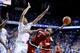 LEXINGTON, KY - DECEMBER 26: Trey Lewis #3 of the Louisville Cardinals shoots the ball while defended by Skal Labissiere #1 of the Kentucky Wildcats at Rupp Arena on December 26, 2015 in Lexington, Kentucky. (Photo by Andy Lyons/Getty Images)