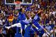 LAWRENCE, KS - JANUARY 30: Skal Labissiere #1 and Jamal Murray #23 of the Kentucky Wildcats foul Wayne Selden Jr. #1 of the Kansas Jayhawks during overtime in the game at Allen Fieldhouse on January 30, 2016 in Lawrence, Kansas. (Photo by Jamie Squire/G