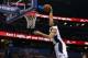 Oct 13, 2015; Orlando, FL, USA; Orlando Magic forward Aaron Gordon (00) dunks against the Miami Heat during the second half at Amway Center. Orlando Magic defeated the Miami Heat 95-92 in overtime. Mandatory Credit: Kim Klement-USA TODAY Sports