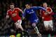 Chelsea's Spanish midfielder Pedro (C) runs past Manchester United's Spanish midfielder Juan Mata during the English Premier League football match between Chelsea and Manchester United at Stamford Bridge in London on February 7, 2016. / AFP / Ian Kington