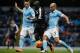 Leicester City's French midfielder N'Golo Kante (C) vies with Manchester City's Argentinian defender Pablo Zabaleta during the English Premier League football match between Manchester City and Leicester City at the Etihad Stadium in Manchester, north west