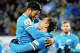 ST. PETERSBURG, RUSSIA - NOVEMBER 21: Artem Dzyuba (C) of FC Zenit St. Petersburg celebrates his goal with Hulk (L) of FC Zenit St. Petersburg during the Russian Football League match between FC Zenit St. Petersburg and FC Ural Sverdlovsk Oblast at the Pe