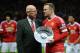 Manchester United's English striker Wayne Rooney receives an award from former Manchester United player Sir Bobby Charlton before playing in his 500th game for his club in the English Premier League football match between Manchester United and Norwich Cit
