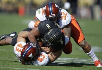 Former Illinois LB T.J. Neal (above)