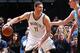 BROOKLYN, NY - FEBRUARY 8: Brook Lopez #11 of the Brooklyn Nets defends the ball against the Denver Nuggets during the game on February 8, 2016 at Barclays Center in Brooklyn, New York. NOTE TO USER: User expressly acknowledges and agrees that, by downloa