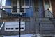 The basement of their grandfather's home, seen through the white, boarded-up windows on the lower left, was the Morris twins' cramped sleeping quarters once they moved in with Thomas during their final few years of high school.