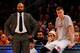 Former Knicks head coach Derek Fisher and Kristaps Porzingis.