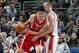 Yao Ming (left) and Zydrunas Ilgauskas.