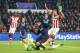 (L-R) goalkeeper Jeroen Zoet of PSV, Angel Correa of Club Atletico de Madrid, Jeffrey Bruma of PSV during the UEFA Champions League Round of 16, First leg match between PSV Eindhoven and Atletico Madrid on February 24, 2016 at the Philips stadium in Eindh