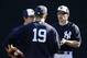 Feb 22, 2016; Tampa, FL, USA; New York Yankees manager Joe Girardi (28) talks with starting pitcher Masahiro Tanaka (19) during practice at George M. Steinbrenner Stadium. Mandatory Credit: Butch Dill-USA TODAY Sports