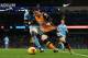 MANCHESTER, ENGLAND - DECEMBER 01: Bacary Sagna of Manchester City in action with Andrew Robertson of Hull City during the Capital One Cup Quarter Final match between Manchester City and Hull City at Etihad Stadium on December 1, 2015 in Manchester, Engla