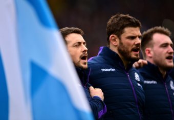 ROME, ITALY - FEBRUARY 27: Greig Laidlaw of Scotland (L) sings the national anthem alongside his team mates during the RBS Six Nations match between Italy and Scotland at Stadio Olimpico on February 27, 2016 in Rome, Italy. (Photo by Dan Mullan/Getty Im