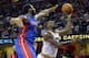 Feb 22, 2016; Cleveland, OH, USA; Detroit Pistons center Andre Drummond (0) defends a shot by Cleveland Cavaliers forward LeBron James (23) in the fourth quarter at Quicken Loans Arena. Mandatory Credit: David Richard-USA TODAY Sports
