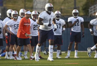 Auburn DC Kevin Steele (left) and DT Montravius Adams (center)