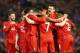 LIVERPOOL, ENGLAND - MARCH 02: James Milner of Liverpool is mobbed by teammates in celebration after scoring his sides second goal during the Barclays Premier League match between Liverpool and Manchester City at Anfield on March 2, 2016 in Liverpool, En