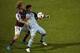 Feb 24, 2016; Tucson, AZ, USA; Sporting Kansas City forward Dom Dwyer (14) and Colorado Rapids defender Stephen Keel (26) battle for the ball during the second half at Kino North Stadium. Sporting Kansas City won 4-1. Mandatory Credit: Casey Sapio-USA TOD