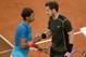 Spanish tennis player Rafael Nadal (L) shake hands to Scottish tennis player Andy Murray at the end of the men final of Madrid Open tournament at the Caja Magica (Magic Box) sports complex in Madrid on May 10, 2015. Murray won 6-3, 6-2. AFP PHOTO/ DANI