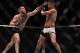 LAS VEGAS, NV - MARCH 05: (L-R) Conor McGregor of Ireland punches Nate Diaz during the UFC 196 event inside MGM Grand Garden Arena on March 5, 2016 in Las Vegas, Nevada. (Photo by Jeff Bottari/Zuffa LLC/Zuffa LLC via Getty Images)