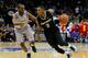 NEWARK, NJ - FEBRUARY 25: Kris Dunn #3 of the Providence Friars drives to the basket as Khadeen Carrington #0 of the Seton Hall Pirates defends during the first half of an NCAA college basketball game on February 25, 2016 at the Prudential Center in Newar